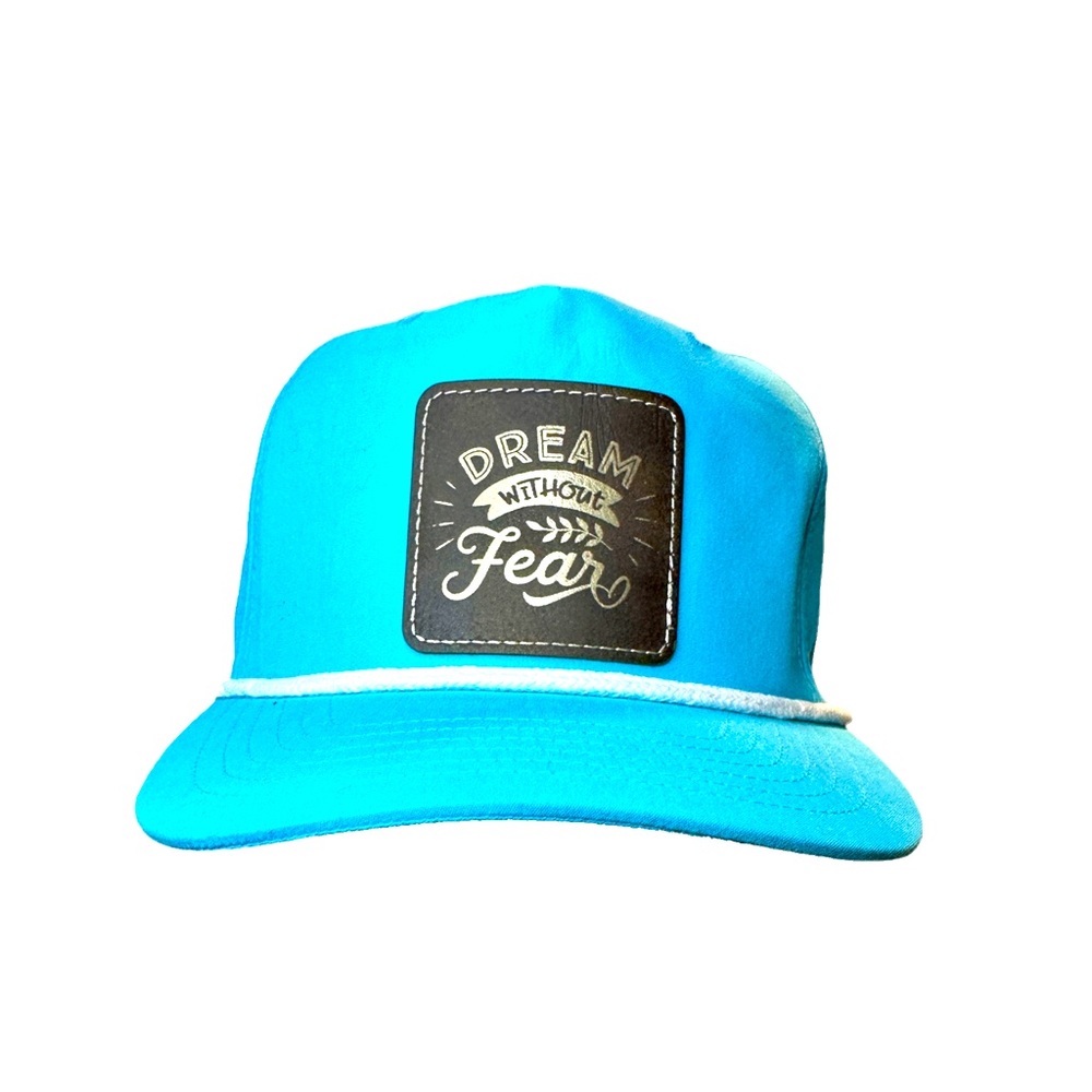 Dream Without Fear Engraved Faux Leather Patch Hat on a Unisex 5-Panel Golf Cap